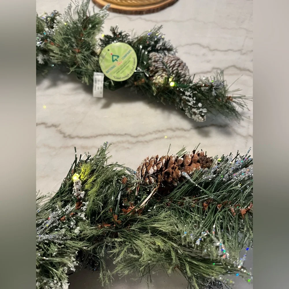 Festive Green Pine Garland with Lights and Pine Cones‎